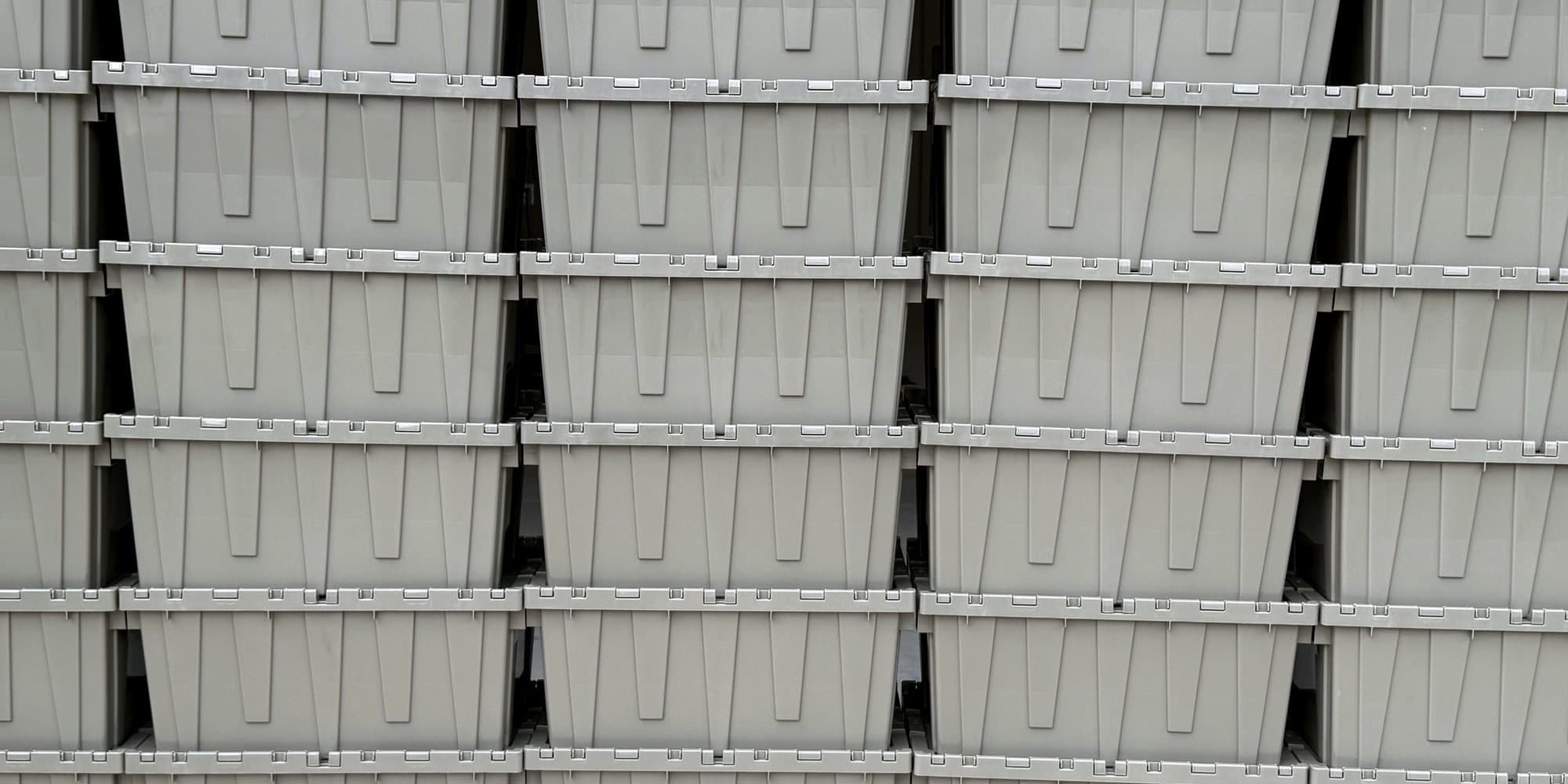 Rows of Cherokee Crate totes stacked and prepped in the staging garage